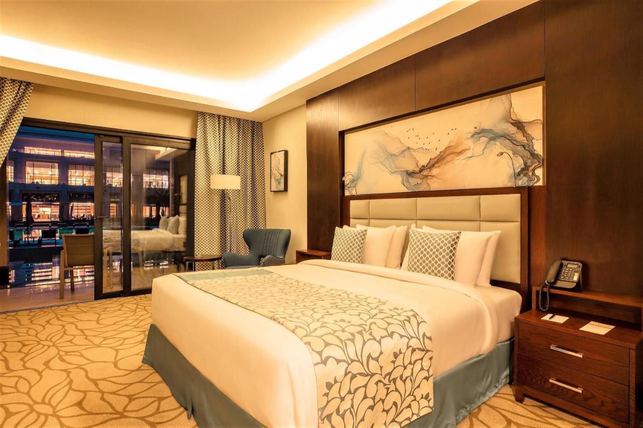 Triumph Luxury Hotel Il Il Cairo Esterno foto A bedroom at the hotel