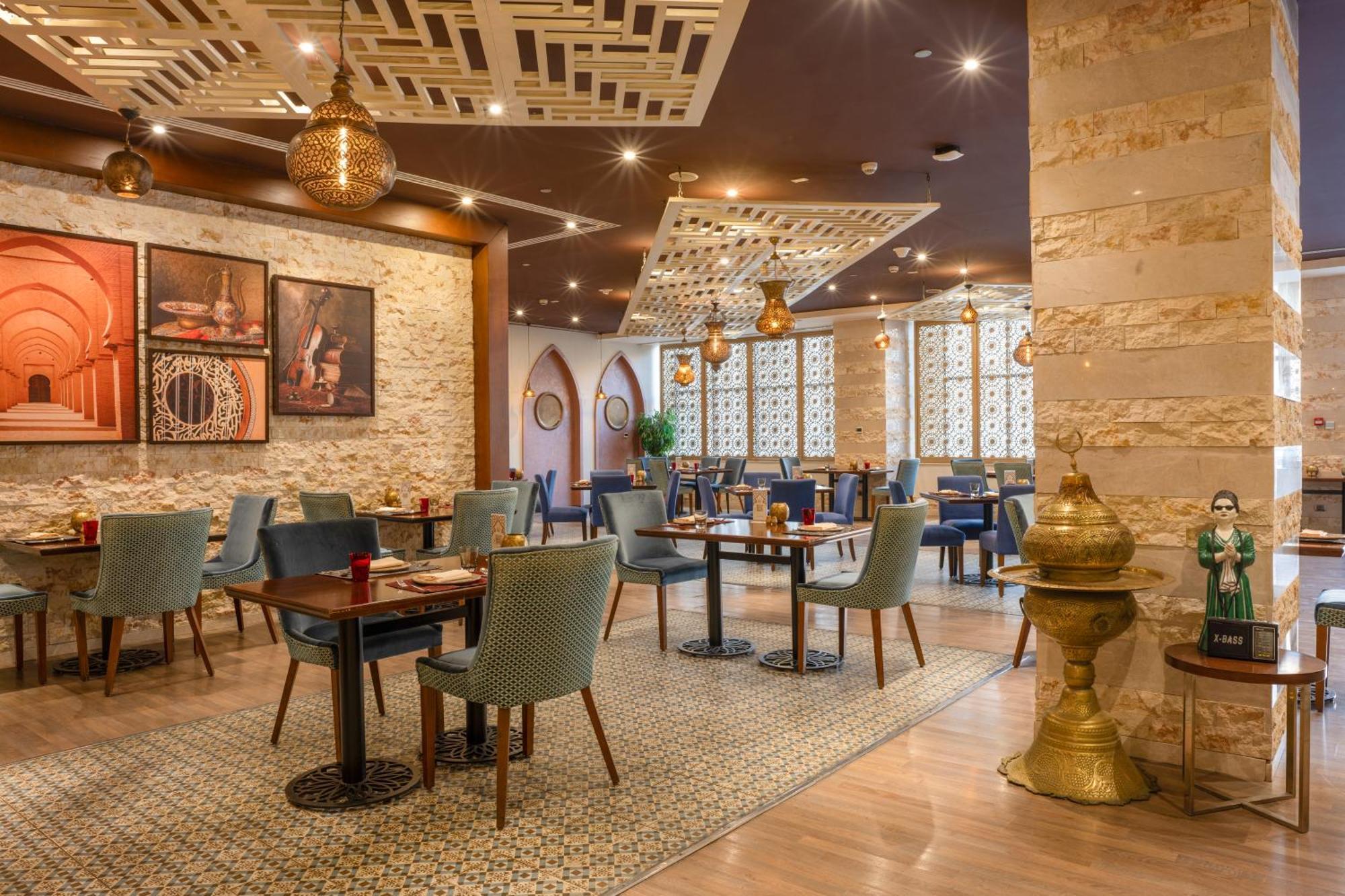 Triumph Luxury Hotel Il Il Cairo Esterno foto Restaurant