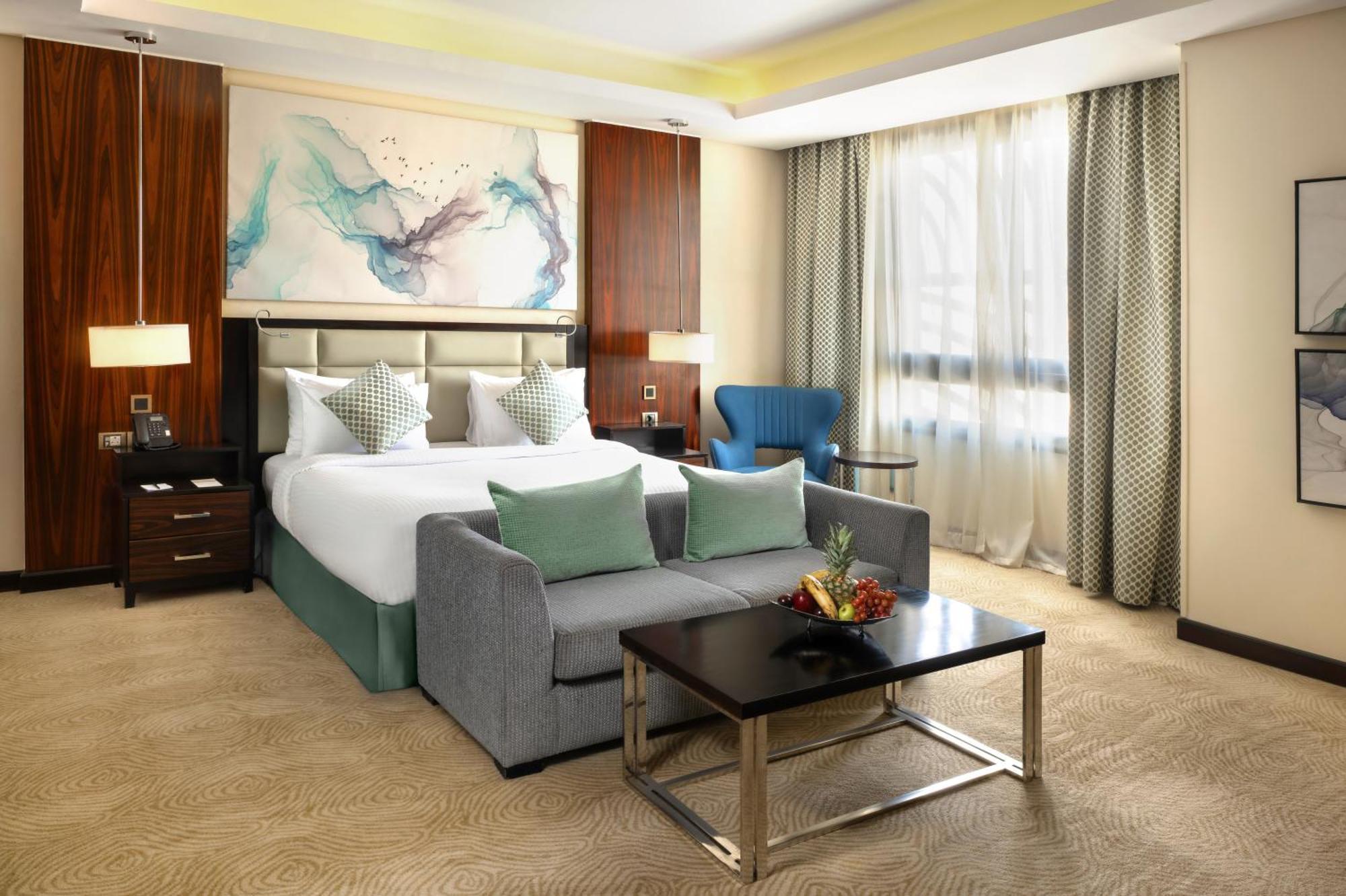 Triumph Luxury Hotel Il Il Cairo Camera foto A room at the hotel
