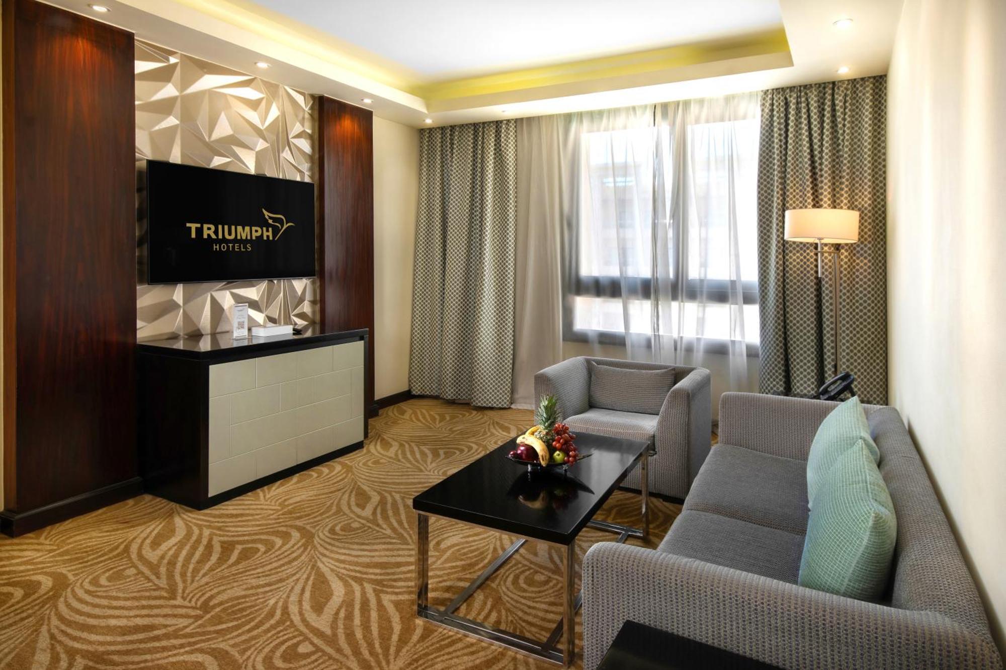 Triumph Luxury Hotel Il Il Cairo Camera foto A suite at the hotel