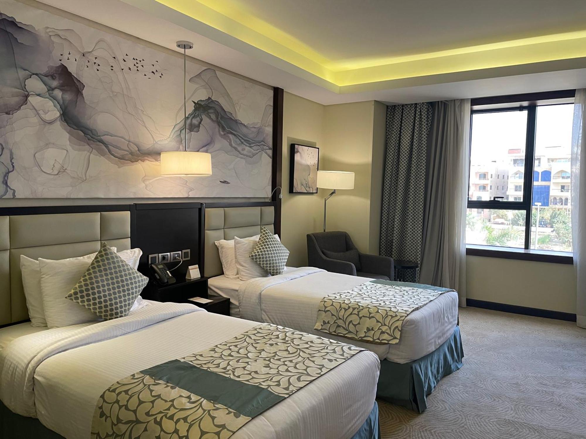 Triumph Luxury Hotel Il Il Cairo Esterno foto A room at the hotel